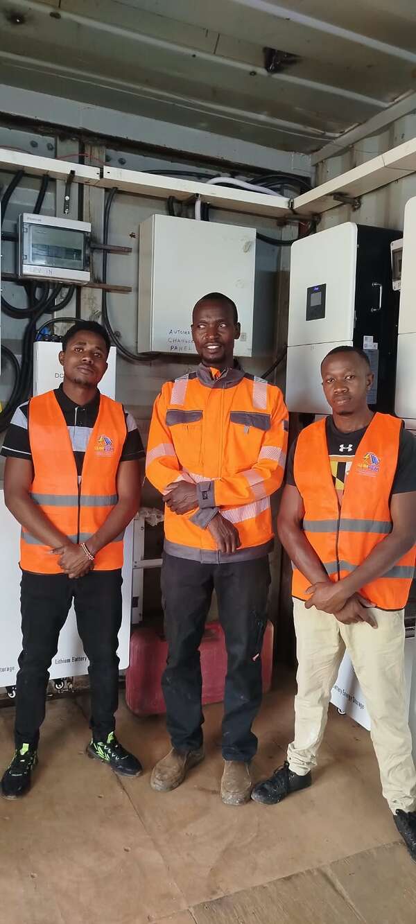 SunPem team working in a battery room during a commercial solar installation in Westlands