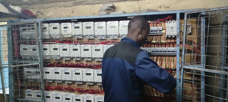 SunPem technician servicing a meter panel in Embakasi, Nairobi